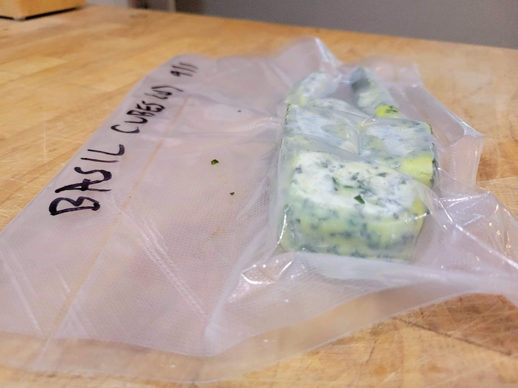 Herb cubes in vacuum-sealed bag