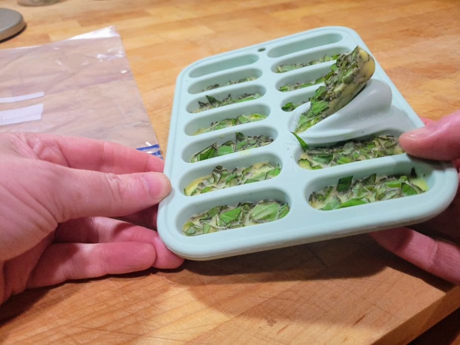 Removing herb cube from silicon ice cube tray