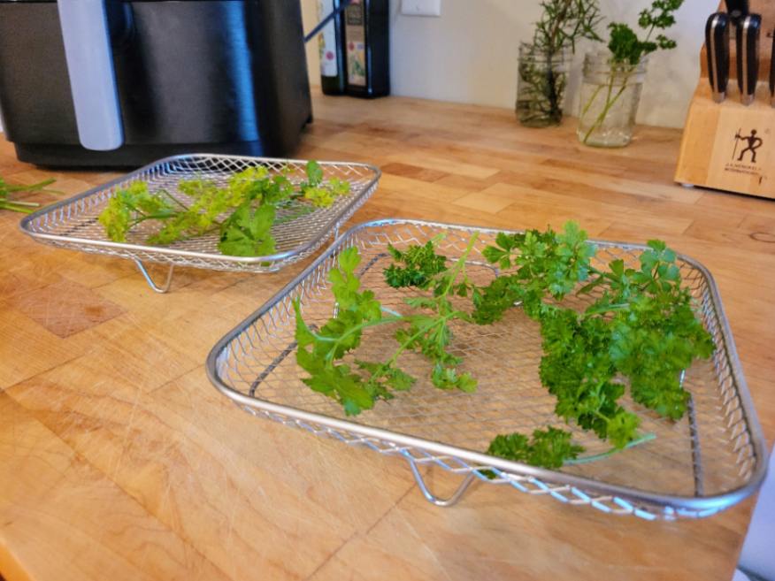 Parsley on air fryer wire baskets